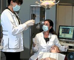 Dentist and Hygienist with Patient